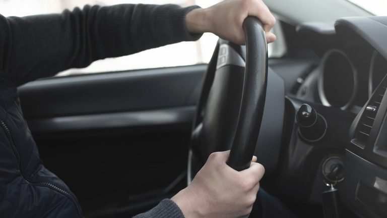 Steering Wheel Rattles Over Bumps – Causes, Risks, and Solutions
